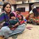 People wait at a school in Kathmandu (Reuters/Navesh Chitrakar)